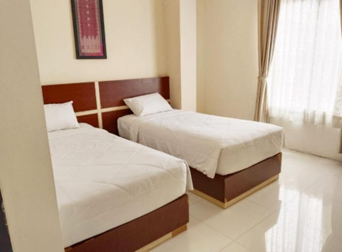 Khariz Hotel บูกิตติงกี ภายนอก รูปภาพ