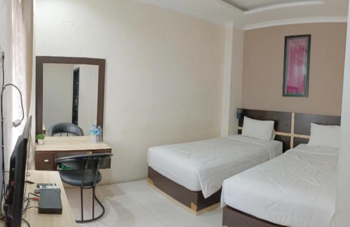 Khariz Hotel บูกิตติงกี ภายนอก รูปภาพ